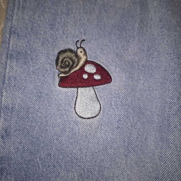 HT Denim Mom Jean in a size 7. It features Pixies, mushrooms, and ladybugs - Picture 12 of 12